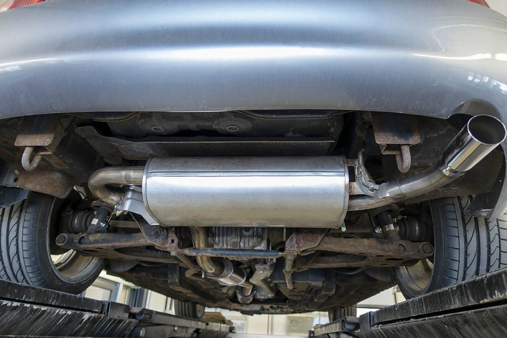 Stock muffler on a vehicle