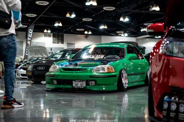Green Honda Civic Hatchback EK9 with dressed up engine bay