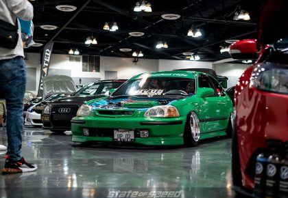 Green Honda Civic Hatchback EK9 with dressed up engine bay