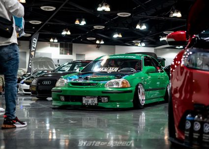 Green Honda Civic Hatchback EK9 with dressed up engine bay