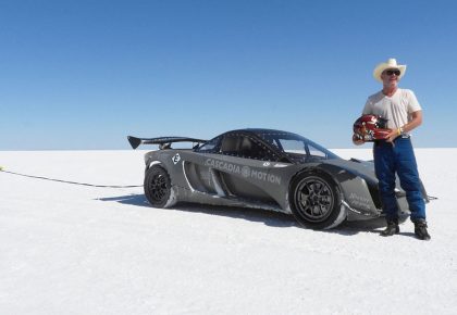 Dennis Palatov next to his electric racecar