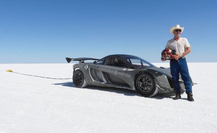 Dennis Palatov next to his electric racecar