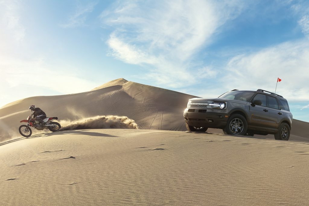 offroad suv in the sand dunes