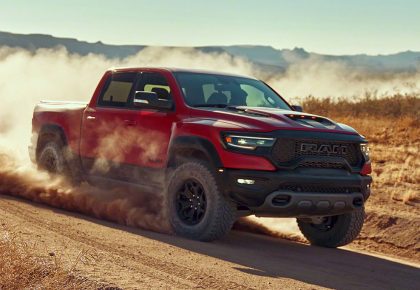 Red RAM 1500 TRX running through the desert