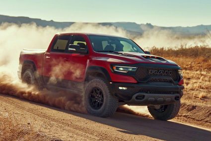 Red RAM 1500 TRX running through the desert