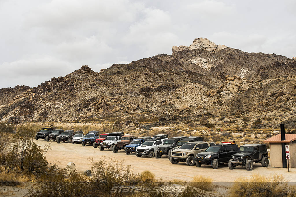 lineup of milestar rigs ready to overland