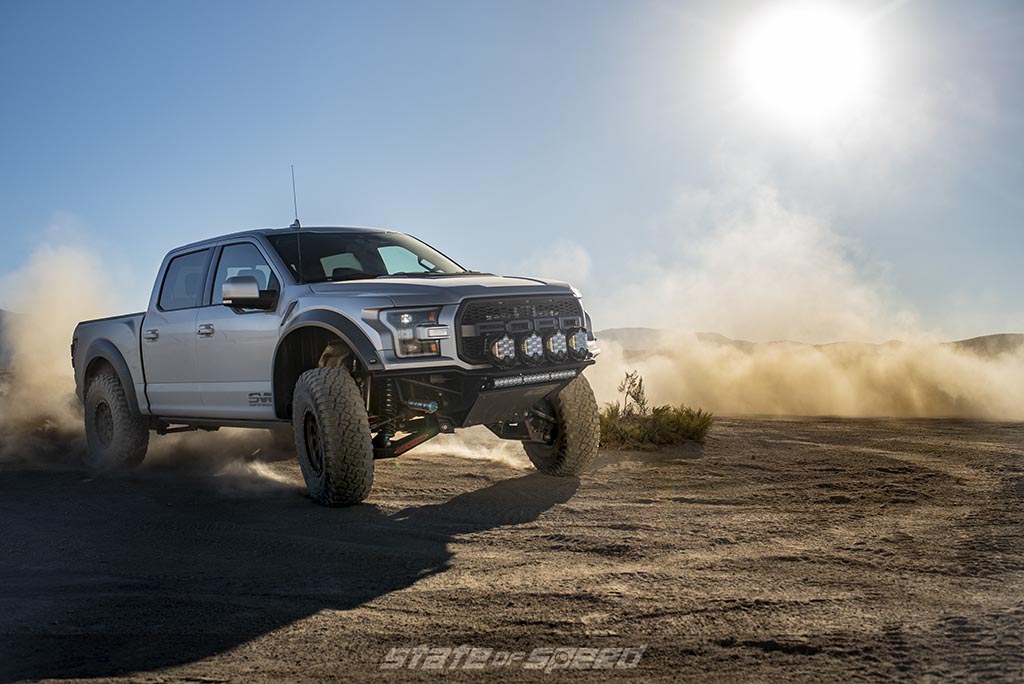 Silver Ford F-150 Raptor Gen 2 with suspension upgrades and wide body kit by SVC