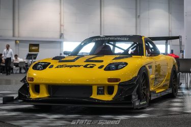 Fortune Auto Yellow RE Amemiya FD RX7 at SEMA 2021