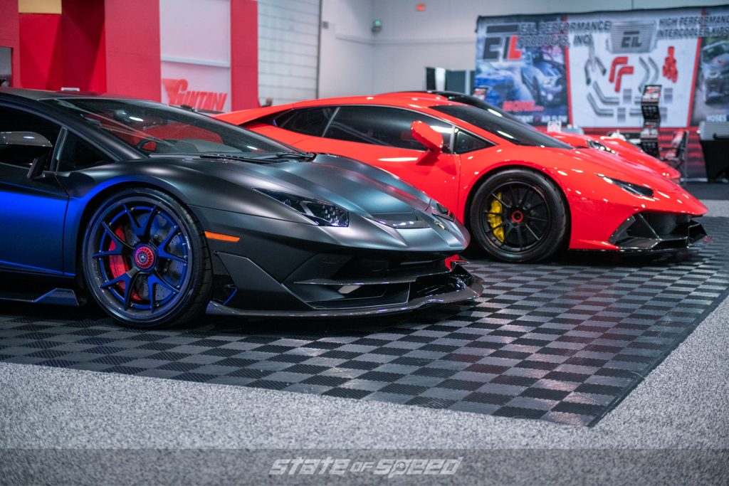 black laborghini aventador sv and pink lamborghini huracan at SEMA 2021