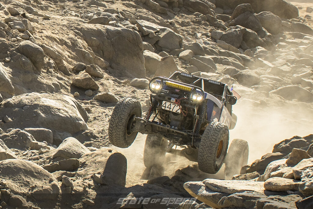 Milestar racer 4472 climbs over some boulders at King of the Hammers 2022