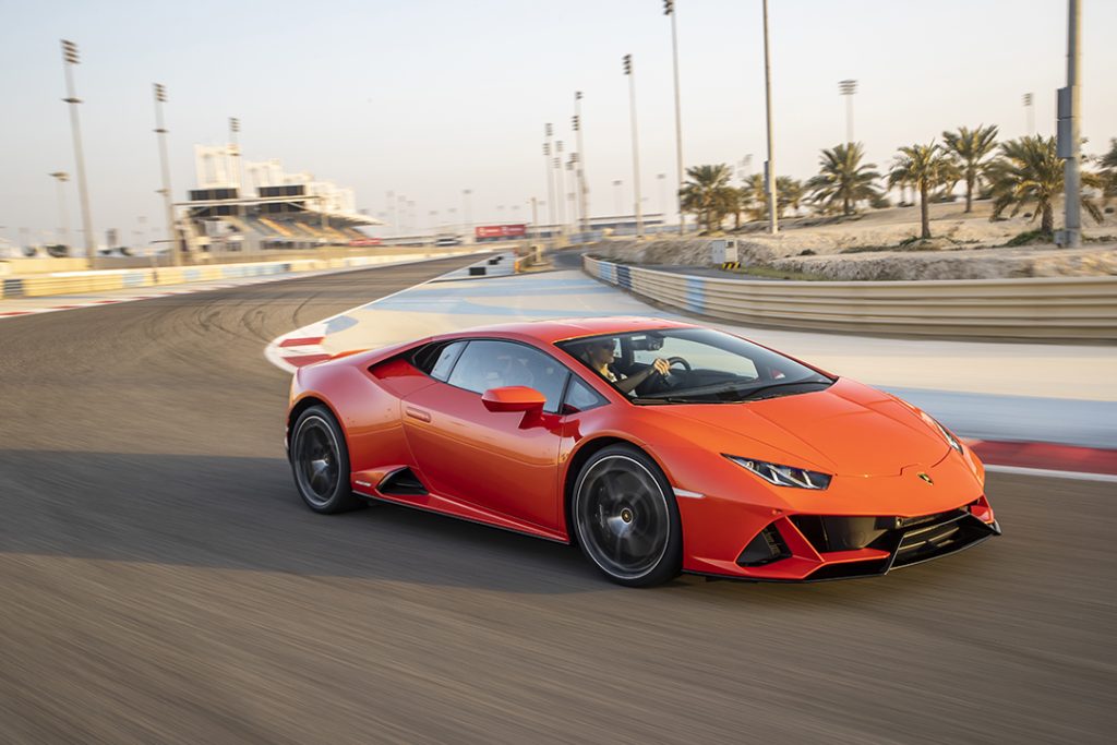 Orange 2023 Lamborghini Huracan EVO on the track