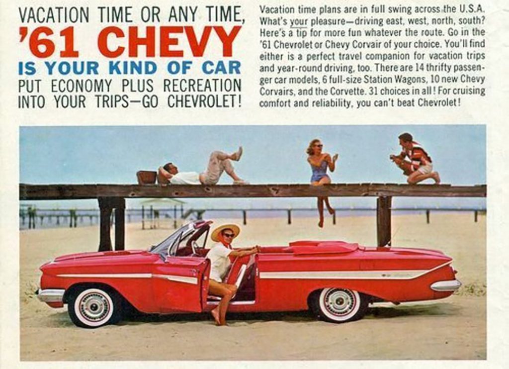Old magazine advertisement featuring a red 1961 Chevrolet Impala