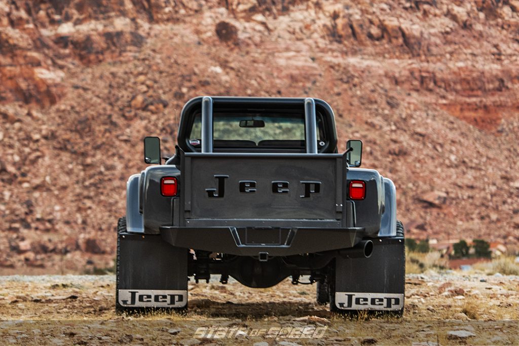rear of the Ford Raptor Lead Foot Grey Jeep J60 Dually by hodson motors 