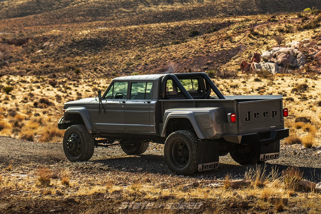rear of a Ford Raptor Lead Foot Grey Jeep J60 Dually by hodson motors 