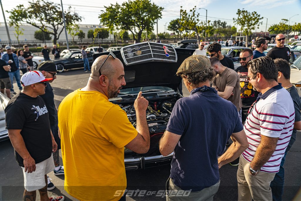 A crows gathers around Blue Nelson's 1982 Mercedes 300TD