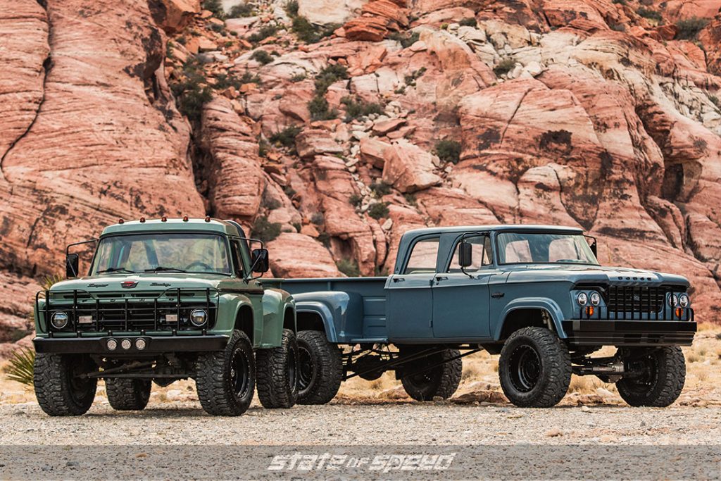 A pair of classic trucks in a canyon