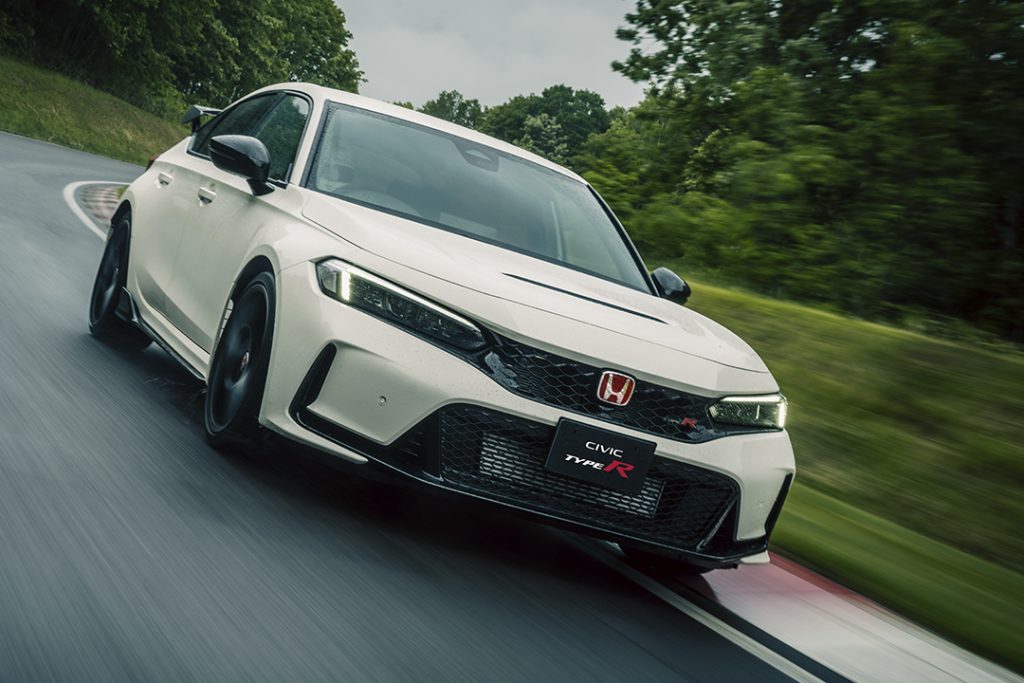 white 2023 Honda Civic Type R racing on the track