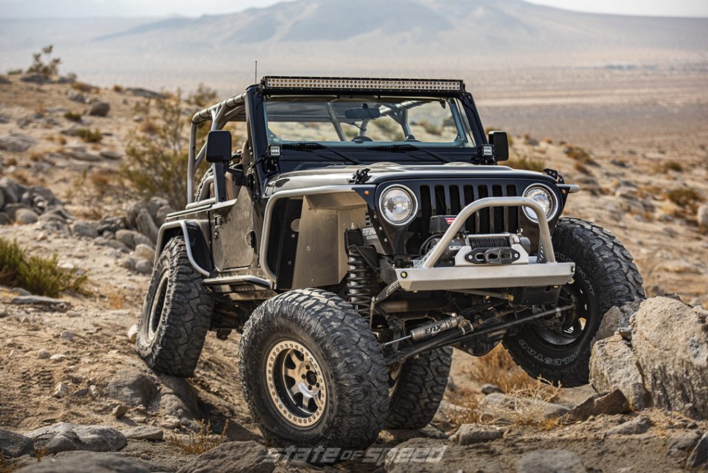 Black jeep TJ at johnson valley on Patagonia M/T Tires
