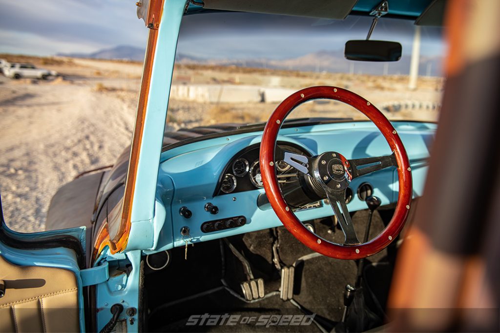 dash and steering wheel of rusty ford f600 by hodson motors