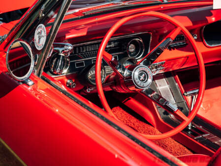Red and chrome interior of the 1964 1/2 Mustang