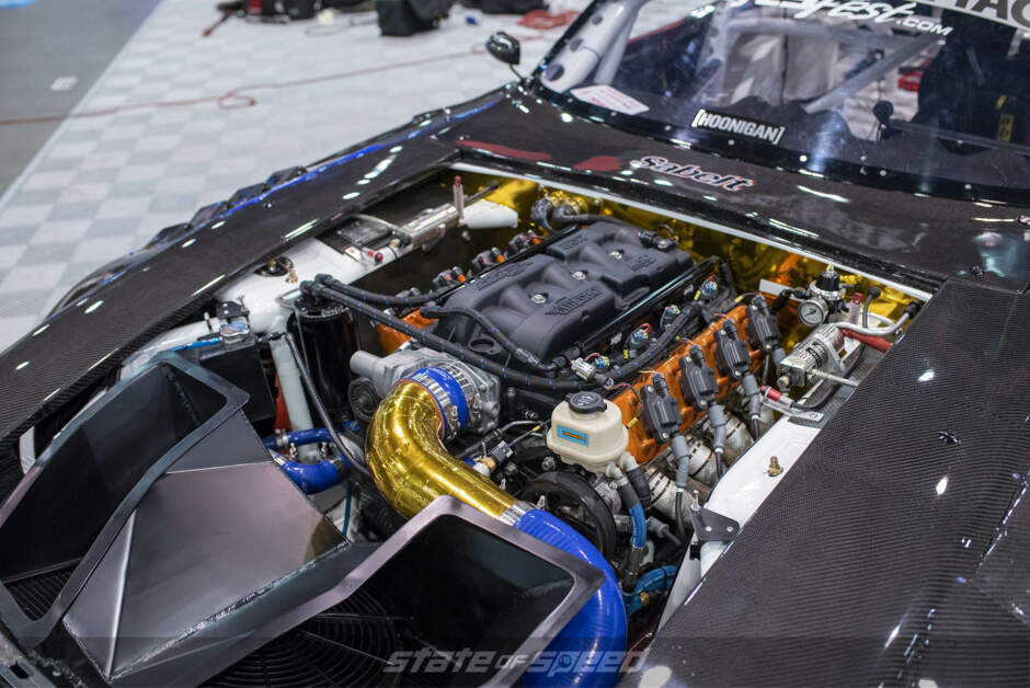 Carbon body 240z with v8 Chevy Silverado engine owned by Shawn Basset at the Holley Performance booth at SEMA 2019