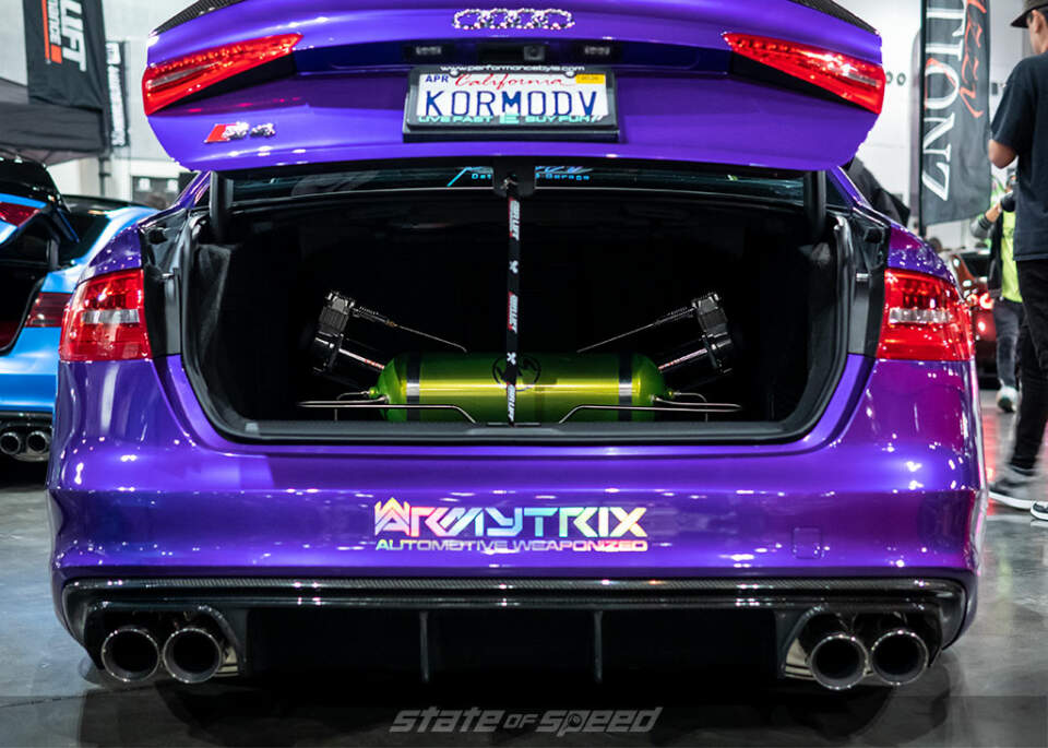 Purple Audi S4 trunk setup with air lift suspension