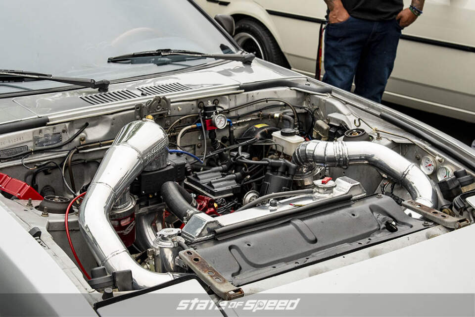 White Mazda RX-7 Second Gen Rotary Engine at State of Speed Los Angeles LA