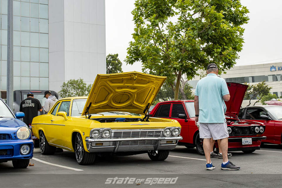 Yellow chevrolet and red datsun at state of speed Los Angeles LA