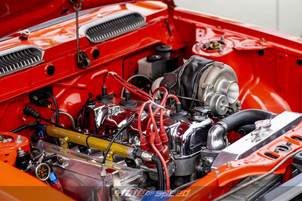 Red Orange Muscle car engine at State of Speed Los Angeles LA