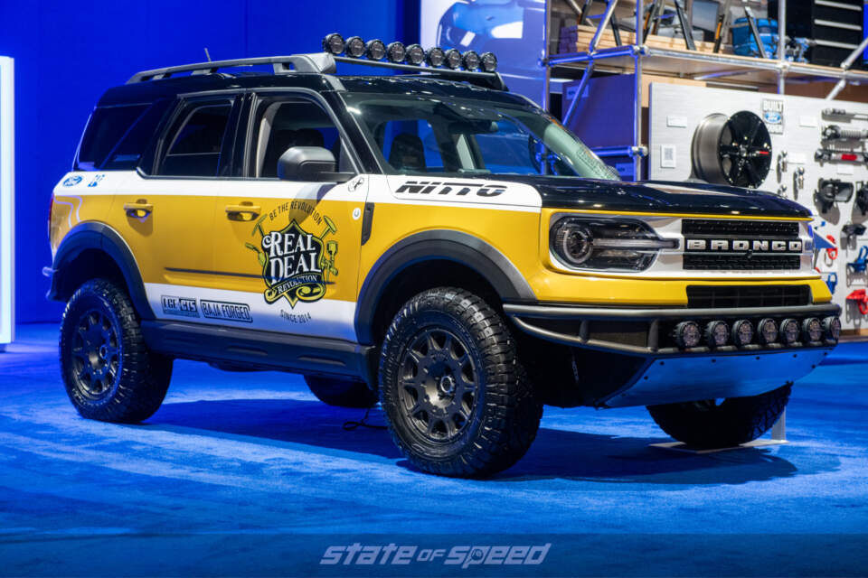 Real Deal Yellow Ford Bronco Sport front at SEMA 2021 Ford Booth