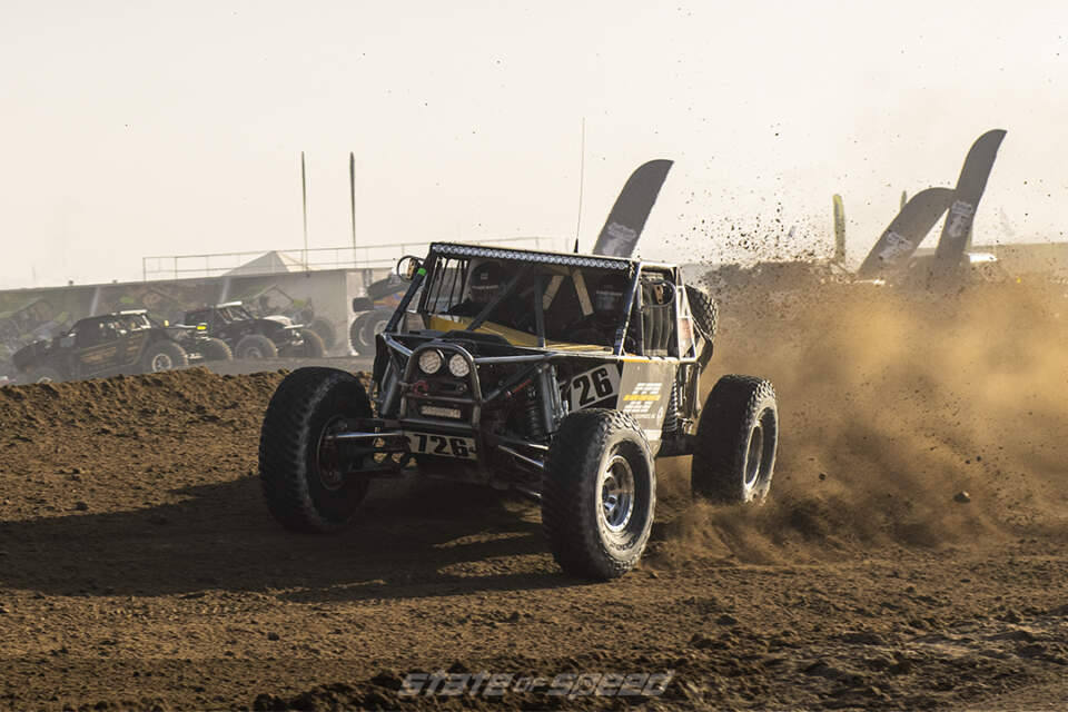 desert racer taking a corner at high speeds at King of the Hammers 2022